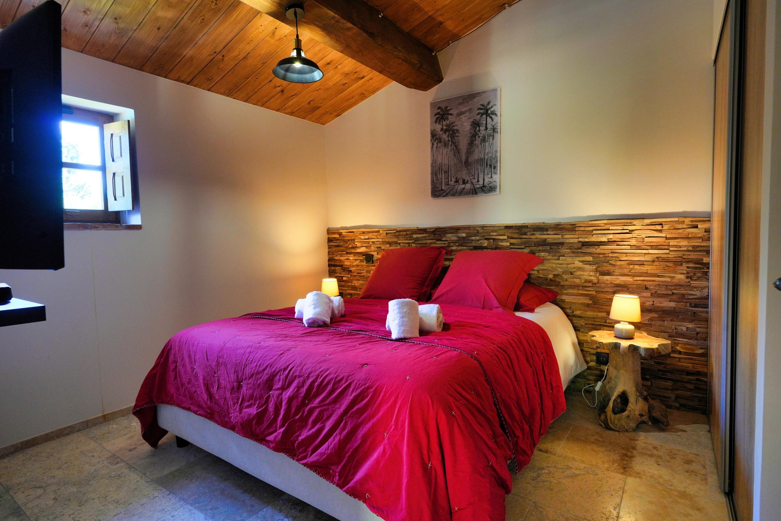 Le lit confortable d'une maison de la résidence Vista Blu